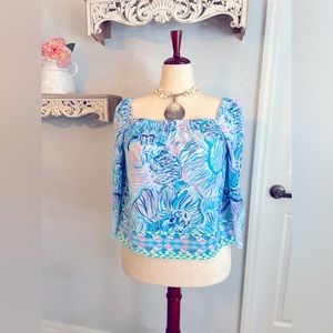 Lilly Pulitzer shirt.